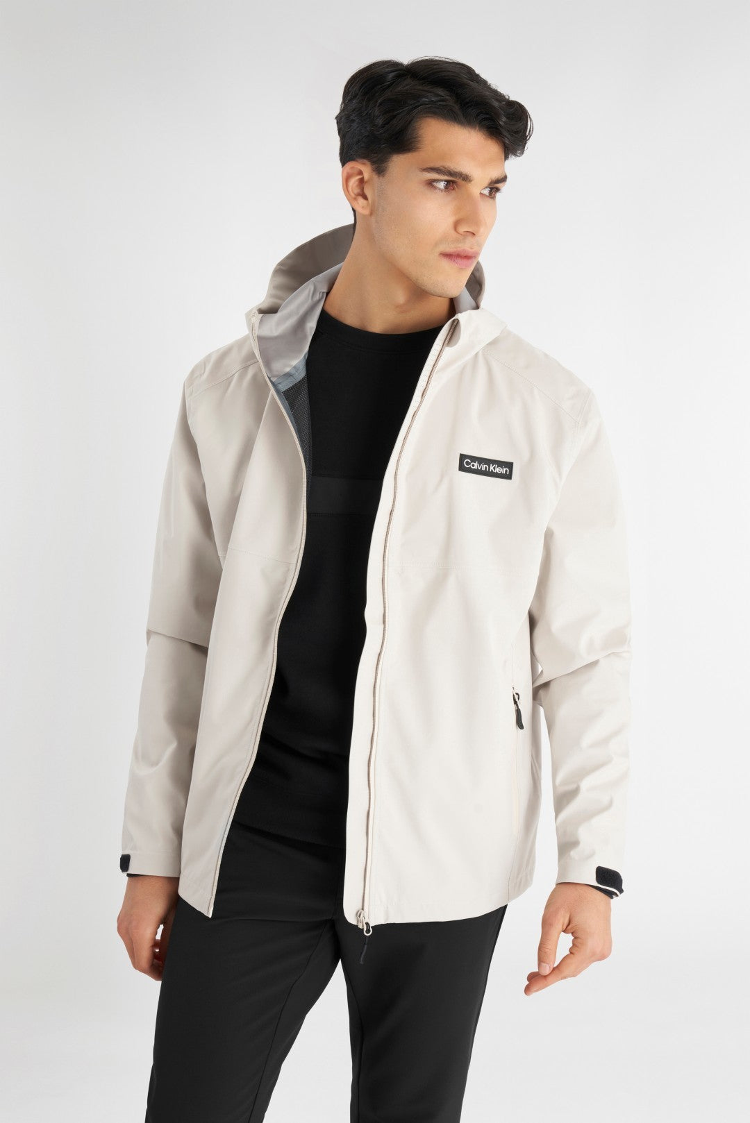 Calvin Klein Feather Dry 15K Hooded waterdichte golfjas | kleur: Zand